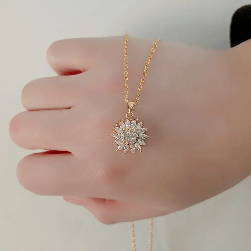 🌻 SpinBloom™ – El Collar Giratorio Que Te Llena de Paz y Elegancia ✨