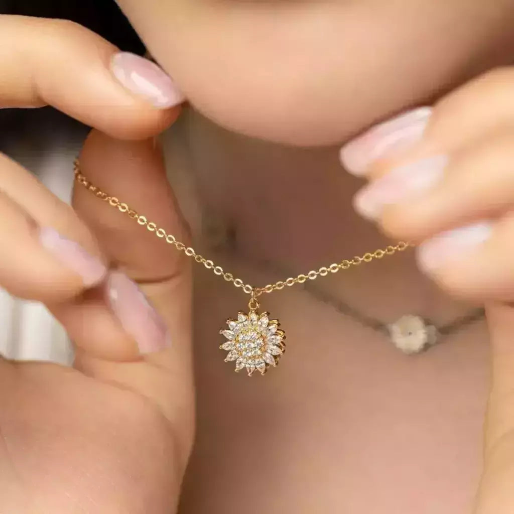 🌻 SpinBloom™ – El Collar Giratorio Que Te Llena de Paz y Elegancia ✨