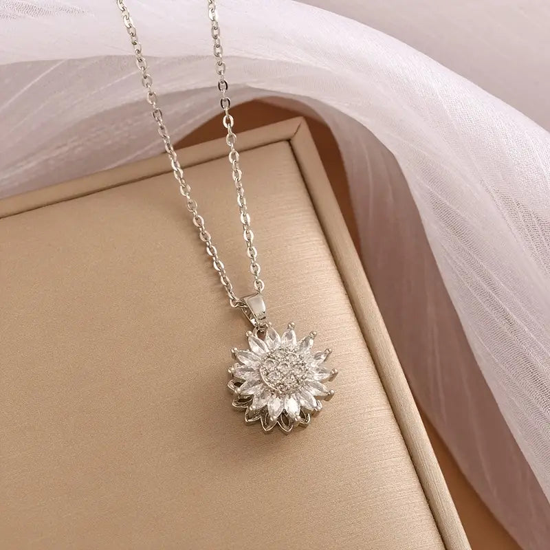 🌻 SpinBloom™ – El Collar Giratorio Que Te Llena de Paz y Elegancia ✨